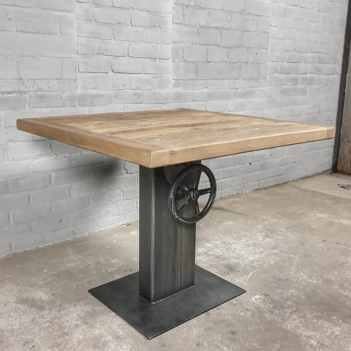 Industrial design bistro table – height adjustable base – IND753