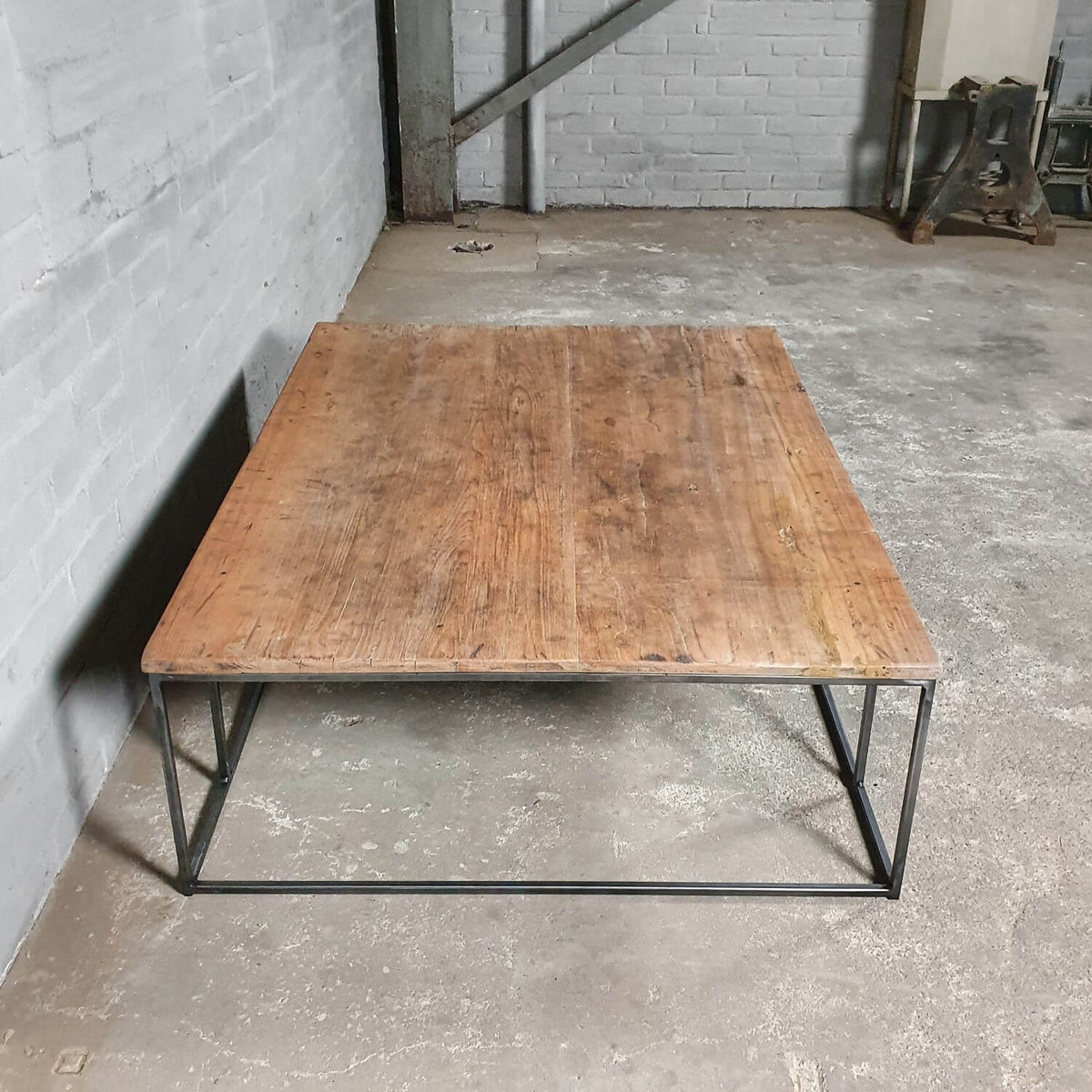 Industrial design coffee table – wood and thin steel base – IND770