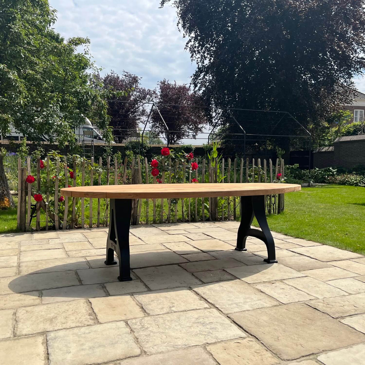 Industrial design teak oval garden table with iron table legs – T15