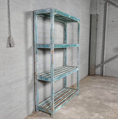 Vintage storage rack of old wood with blue patina