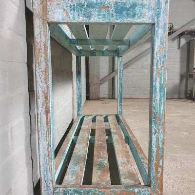 Vintage storage rack of old wood with blue patina