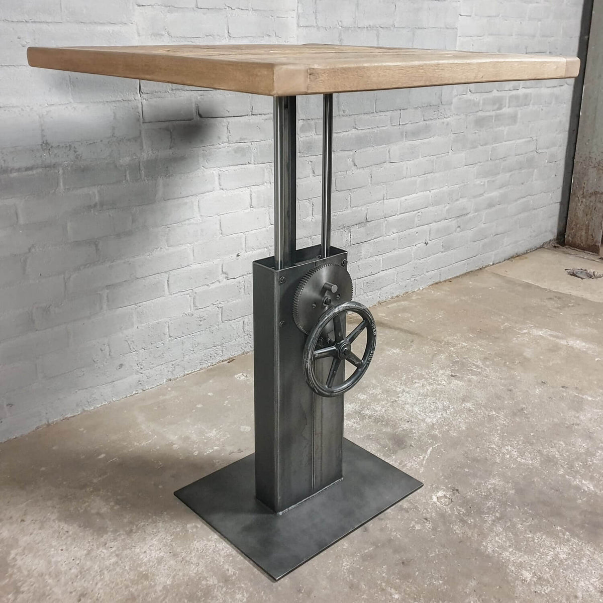 Industrial design bistro table – height adjustable base – IND753