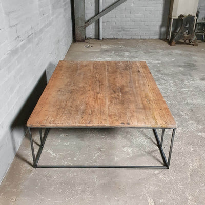 Industrial design coffee table – wood and thin steel base – IND770