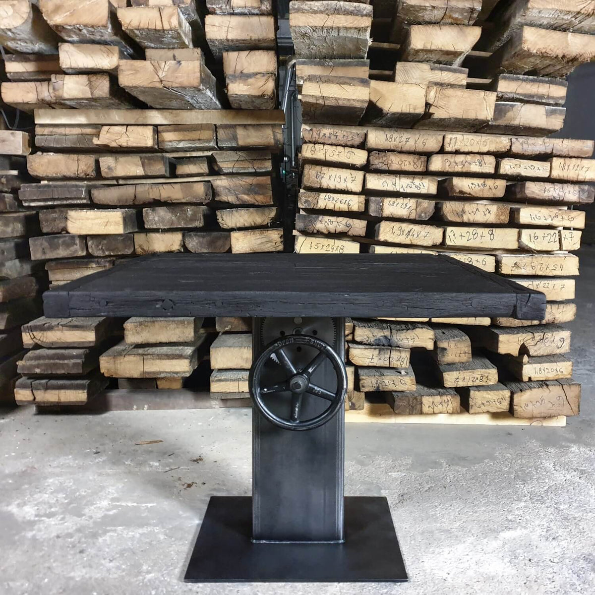 Industrial design bistro table – height adjustable base – charred reclaimed oak tabletop – IND782