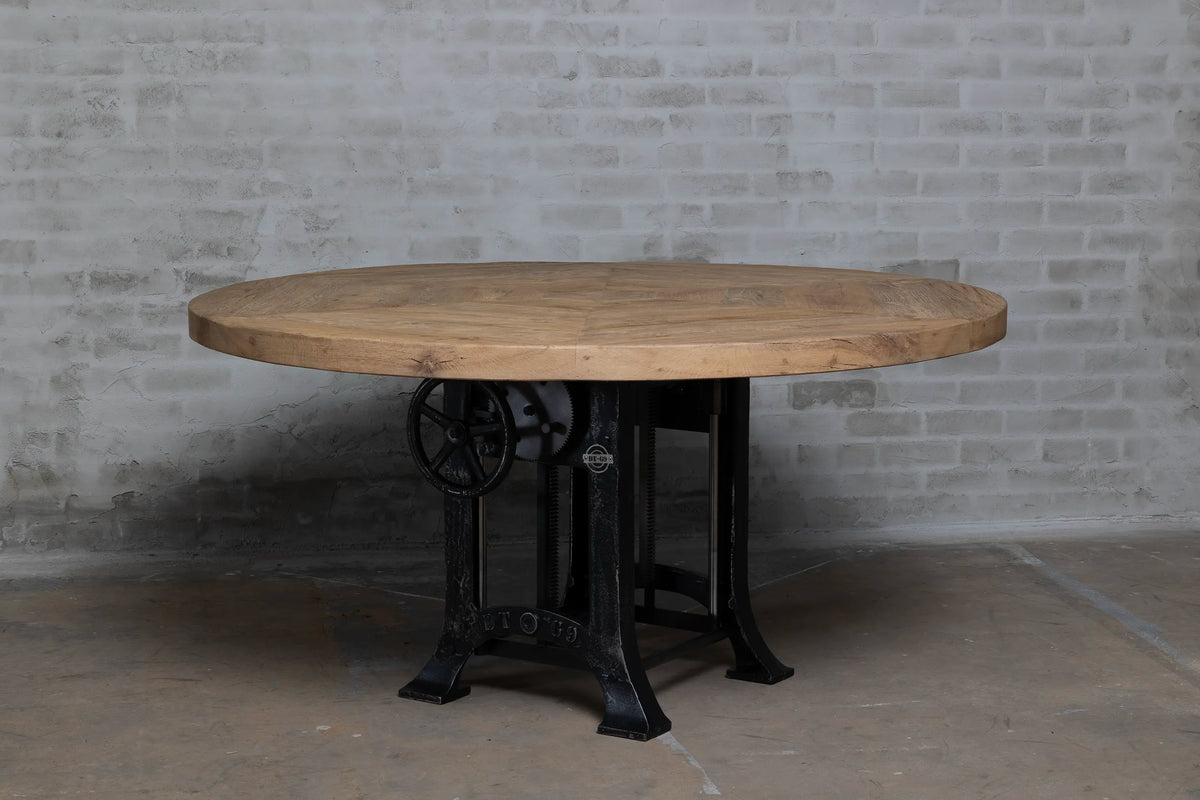 Vooraanzicht ronde eiken eettafel met in hoogte verstelbare tafelpoten