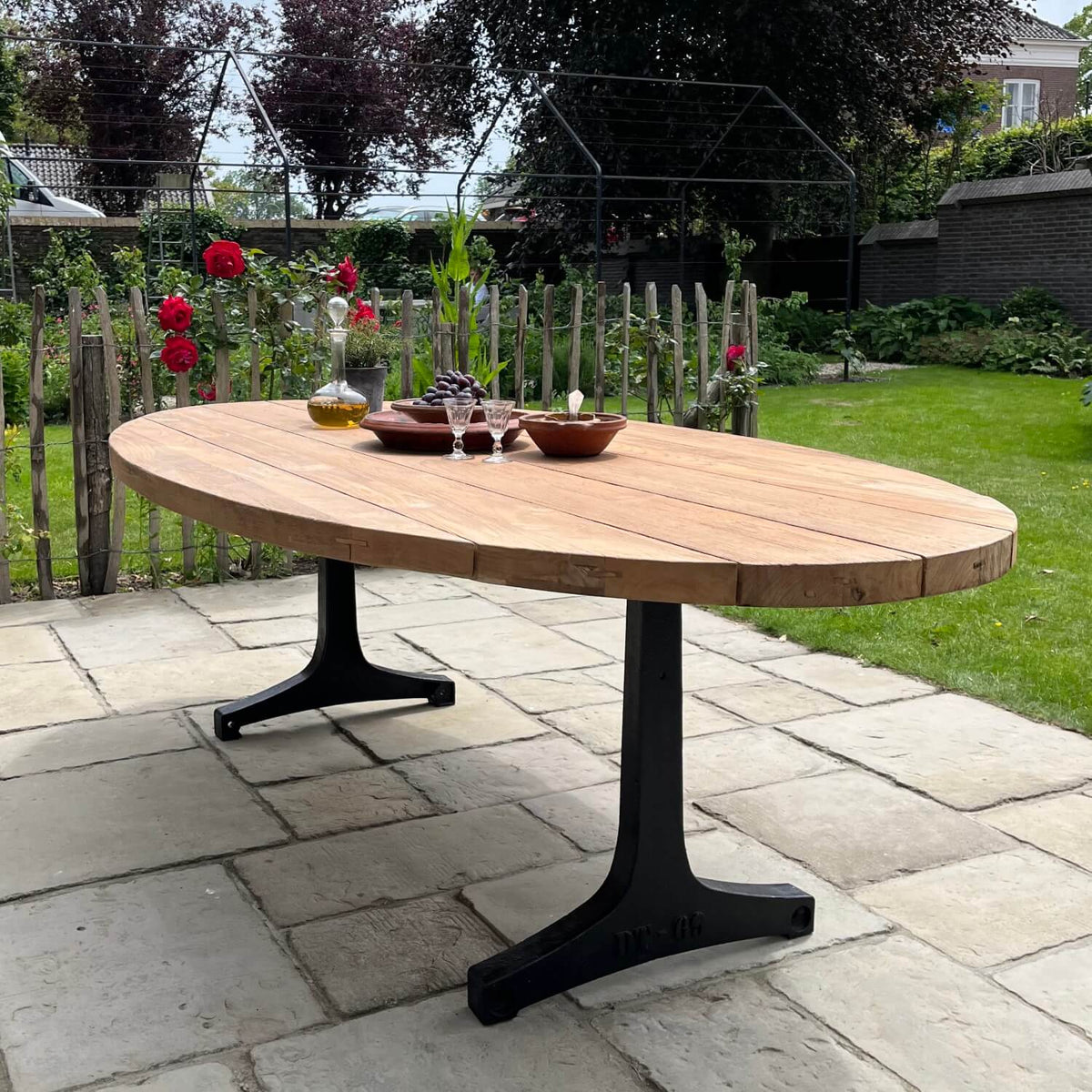 Industrial design teak oval garden table with iron table legs – T14