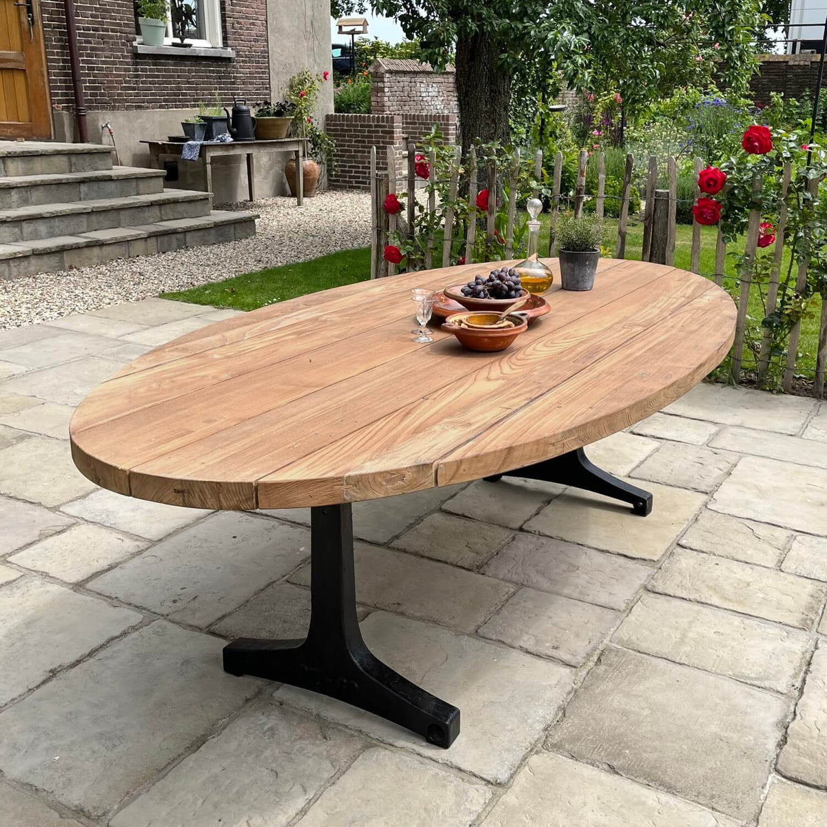 Industrial design teak oval garden table with iron table legs – T14