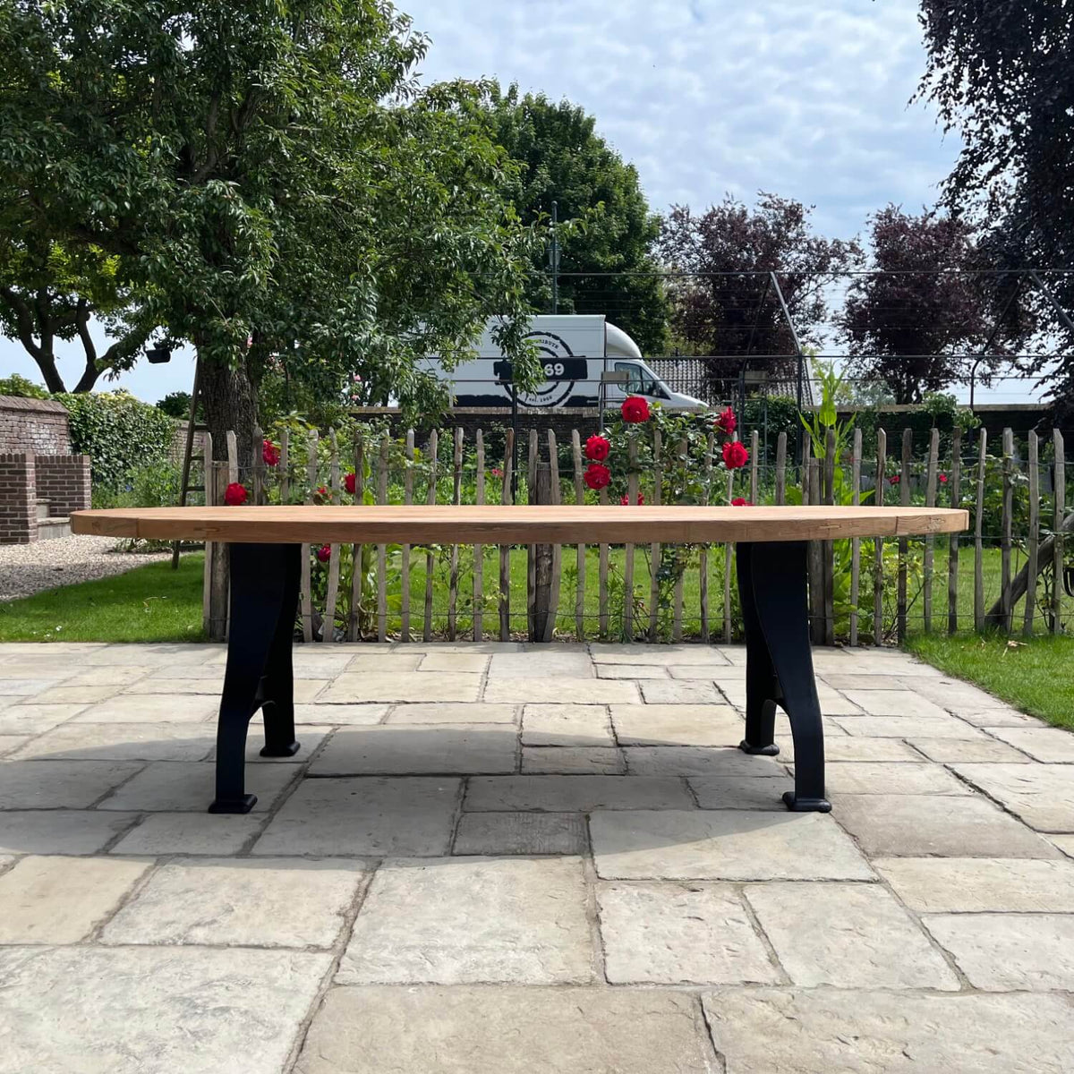 Industrial design teak oval garden table with iron table legs – T15