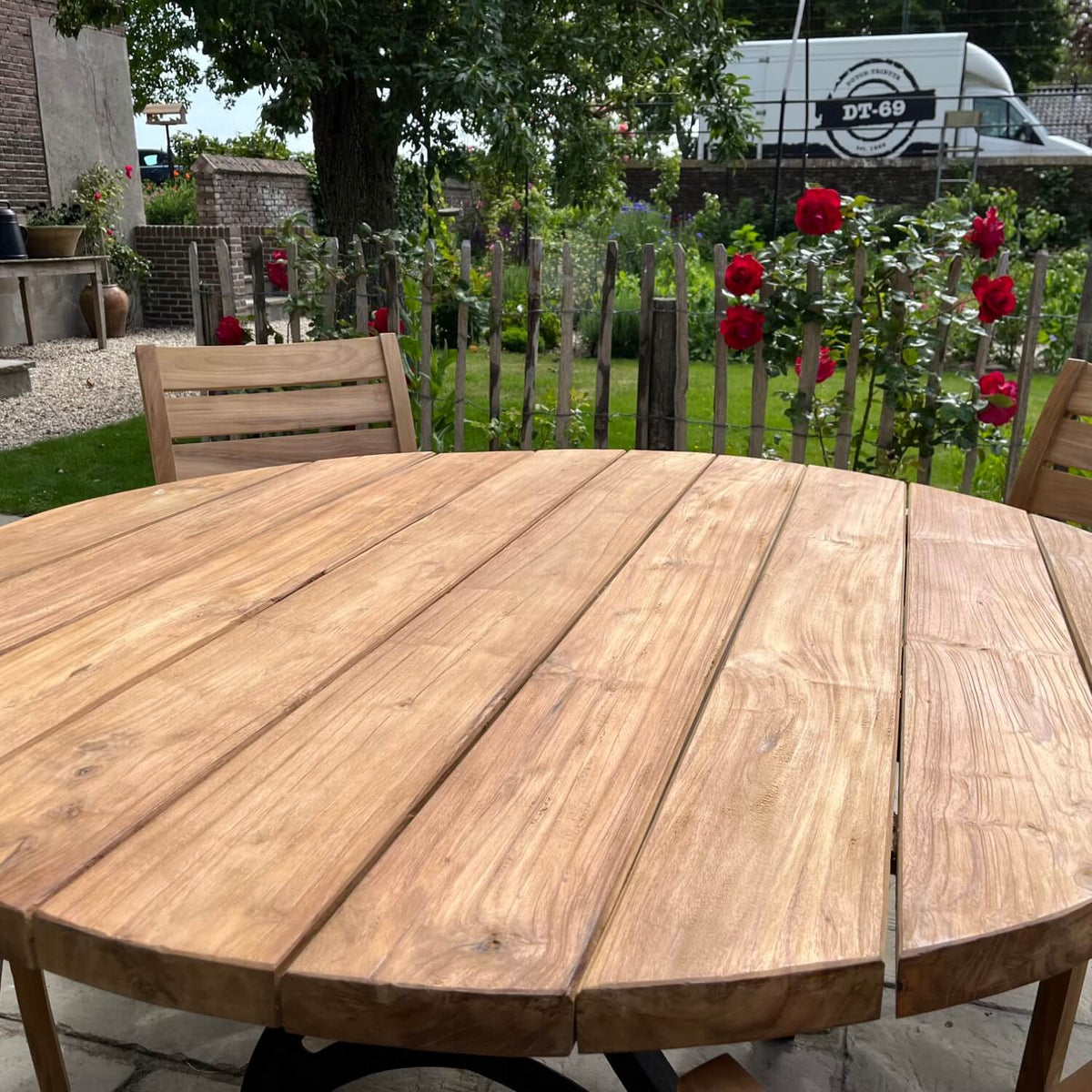Round Industrial design teak garden table with iron table legs – T17