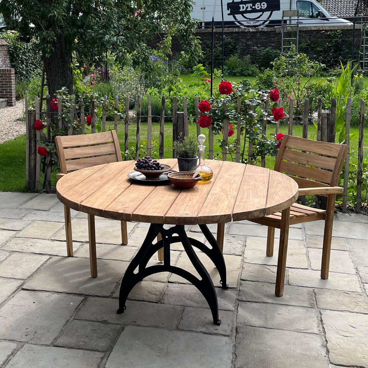 Round Industrial design teak garden table with iron table legs – T17
