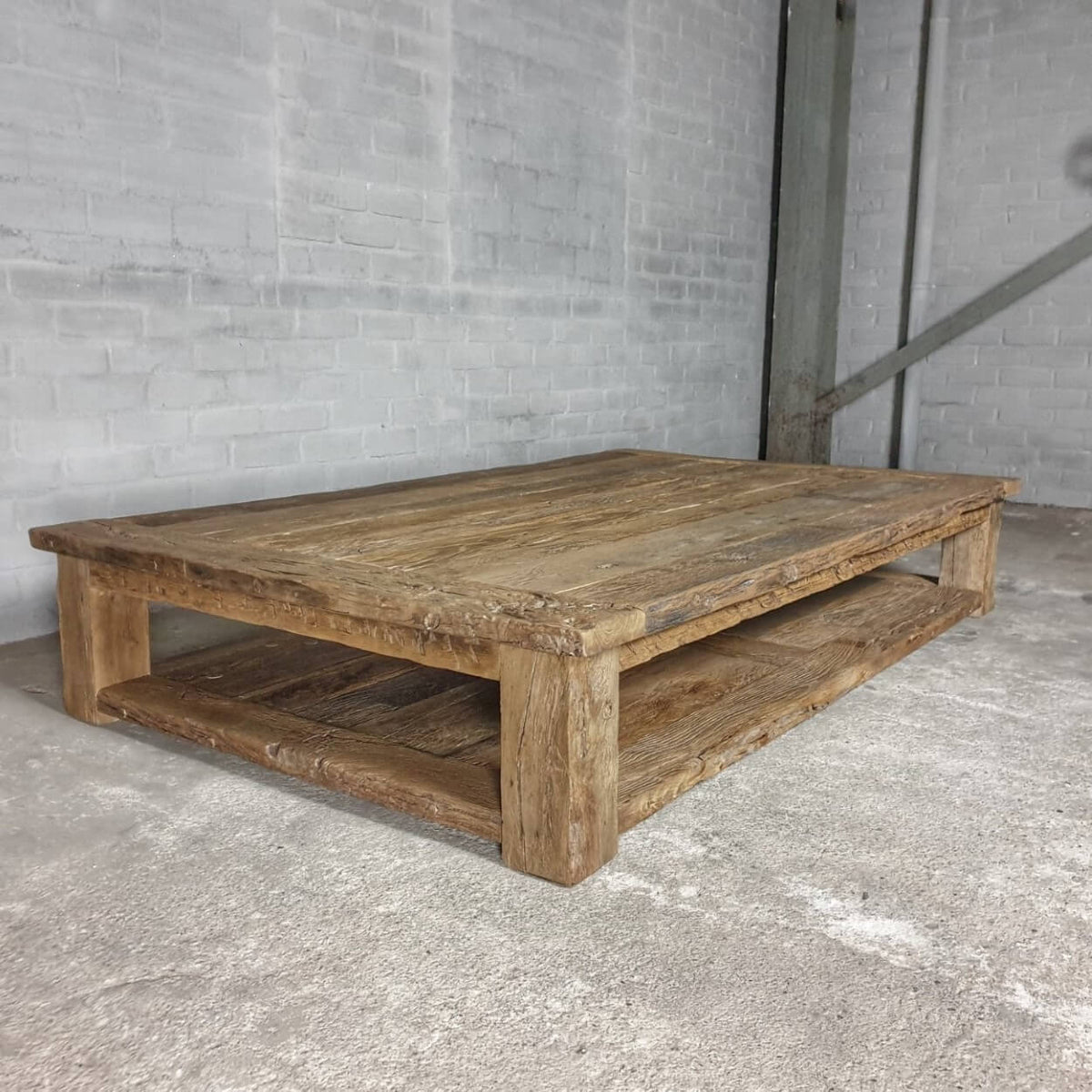 Robust farmhouse style coffee table Colmar – extra bottom shelf – sunburned reclaimed oak