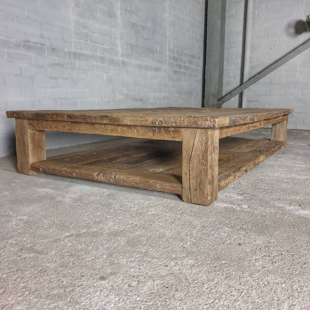Robust farmhouse style coffee table Colmar – extra bottom shelf – sunburned reclaimed oak